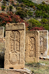 Fototapeta na wymiar Armenian cross-stones, khachkars at Noravank 13th century monastery in Armenia.