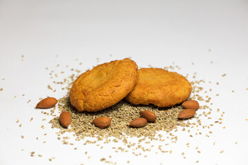 sesame and almonds (without shell), homemade cookies, white background