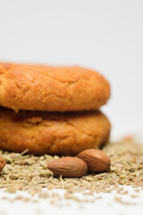 almonds (without shell) and sesame, homemade cookies, white background