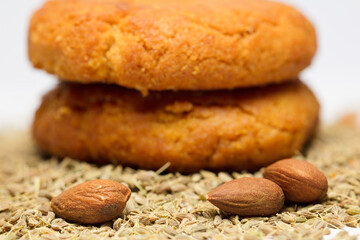 almonds (without shell) and sesame, homemade cookies, white background
