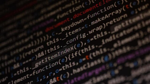 Code. Javascript computer programming code texture sliding close up pixel detail shot 4K super macro on screen.