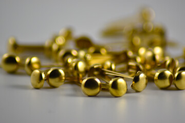 close-up of brass-plated clips