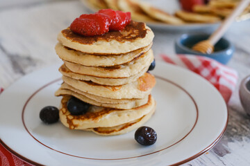 Delicious pancakes with blueberry and honey
