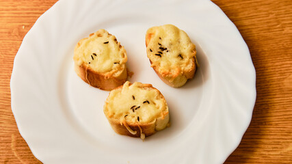 Tasty oven baked appetizers with cheese