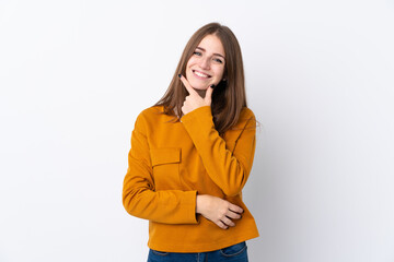 Young woman over isolated white background smiling