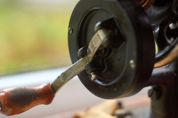 Photo of old sewing machine manual handle