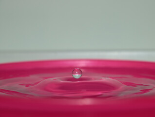 Drop sphere suspended above the crater-shaped base