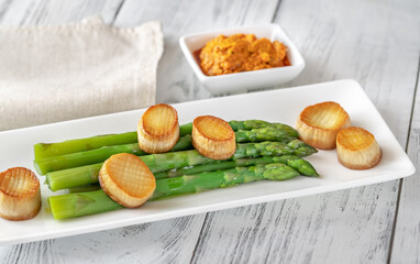 Boiled asparagus with mushrooms