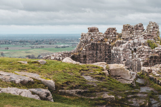Dramatic images of Beeston Castle Remains in Cheshire, UK on cloudy winter day