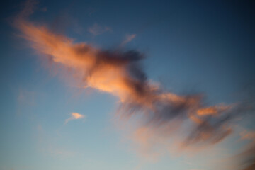 red cloud on blue sky at sunset