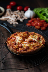 Homemade deep dish skillet pan pizza ready for serving.