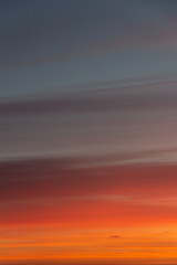 Wonderful autumn evening sky of various pleasant colors (blue, purple, pink, orange, yellow) at sunset