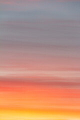 Wonderful autumn evening sky of various pleasant colors (blue, purple, pink, orange, yellow) at sunset