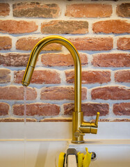 Beautiful faucet for water, kitchen faucet for washing dishes with a beautiful background