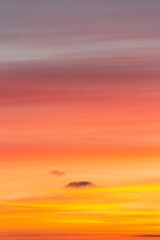 Wonderful autumn evening sky of various pleasant colors (blue, purple, pink, orange, yellow) at sunset