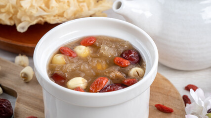 Close up of sweet snow white fungus soup with lotus seed, Chinese red dates and wolfberry.