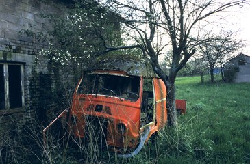 Abandoned Van Growing  into the Scenery