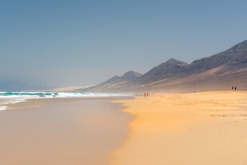 Fototapeta na wymiar Virgin beaches on the island of Fuerteventura. Cofete beach on the island of Fuerteventura, Spain