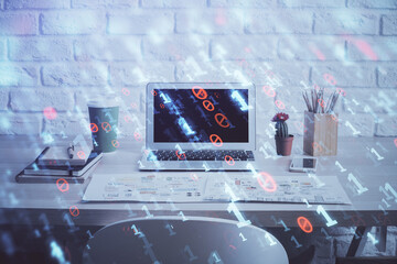 Double exposure of desktop computer and technology theme hologram. Concept of software development.