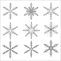 Set of black isolated snowflakes icon silhouette on white background.