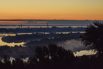 dawn over the cable car across the river