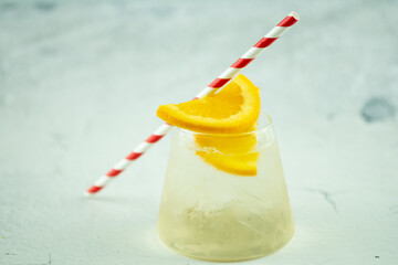 Summer cold drinks homemade iced tea with orange slice