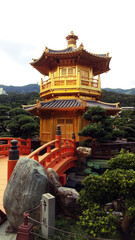 Golden Pagoda with red bridge in Nan Lian gardens, Kowloon City, Hong Kong
