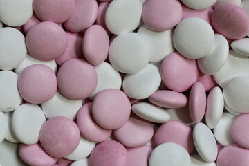 white and pink chocolate mints as background