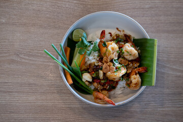 Stir fried shrimp with garlic on rice