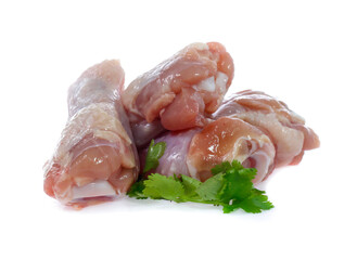 raw chicken legs on a white background