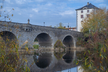 View of the Lahn Bridge and its reflection in Limburg / Germany in autumn