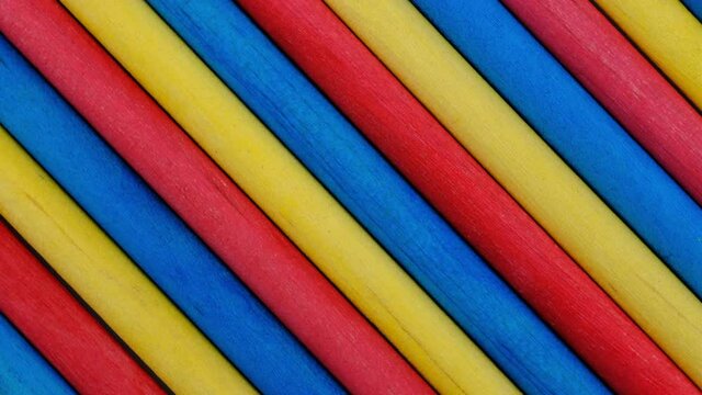 Background. Creative abstract colorful sticks circular motion 4K.
