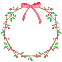 christmas wreath with holly berries and ribbon