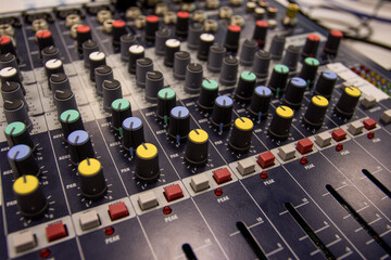 Sound console during live online broadcast. 