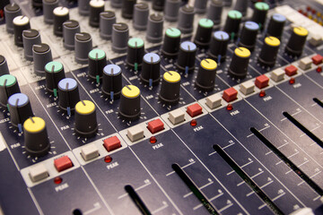 Sound console during live online broadcast. 