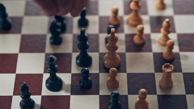 Chess: White has been victorious by defeating the black side's king.