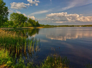 Landscape of a Pogoria Lake in Dabrowa Gornicza. Cloudy sky.