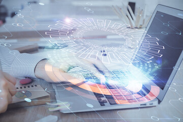 Businessman working on Laptop with technology theme drawing. Concept of big data. Double exposure.