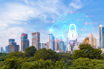 Padlock icon hologram over panorama city view of Bangkok to protect business in Asia. The concept of information security shields. Double exposure.