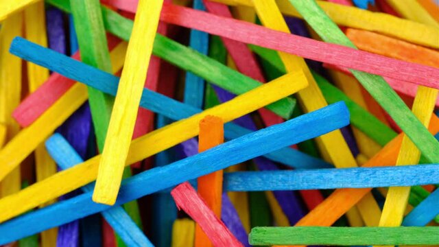 Background. Abstract creative colorful stack of sticks circular motion 4K. Diversity concept.