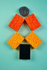 Flat lay of  cleaning set for dish washing blue background with copy space, Detergents service concept, Top view..