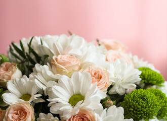 A bouquet of white flowers on a delicate background.