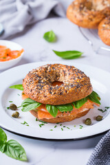 Plating, fast lunch, meal. Bagels with cream cheese and salmon