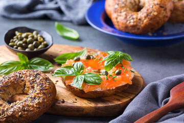 Plating, fast lunch, meal. Bagels with cream cheese and salmon