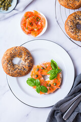 Plating, fast lunch, meal. Bagels with cream cheese and salmon