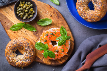 Plating, fast lunch, meal. Bagels with cream cheese and salmon