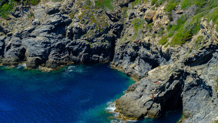 Naklejka na ściany i meble Steep cliff in the blue bay of Mediterranean sea, Calanques