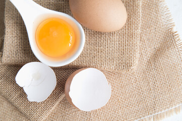 Eggs chicken on white wood background