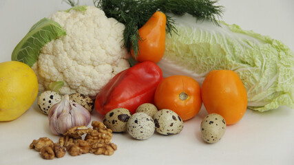 fresh vegetables, cabbage, cauliflower, sweet pepper, quail eggs, garlic, tomatoes, walnuts and bread