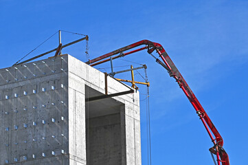 Crane and highrise construction site